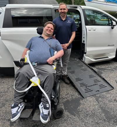 Paul Porter (left) pictured with his modified vehicle and Casey Moore, the People Inc. EMODs coordinator who assisted the project