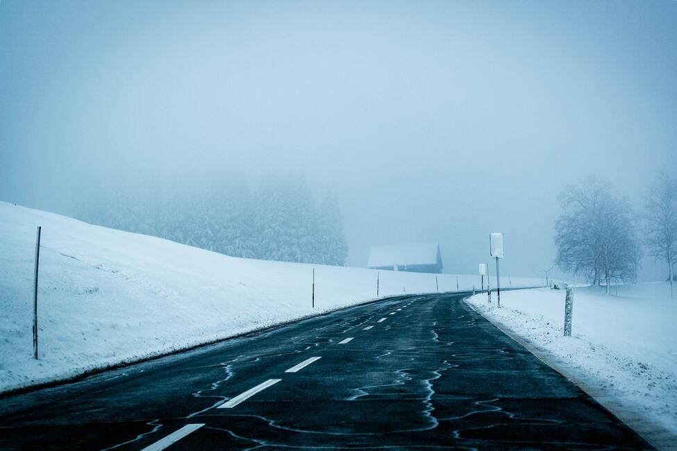 Highway road surrounded by snow