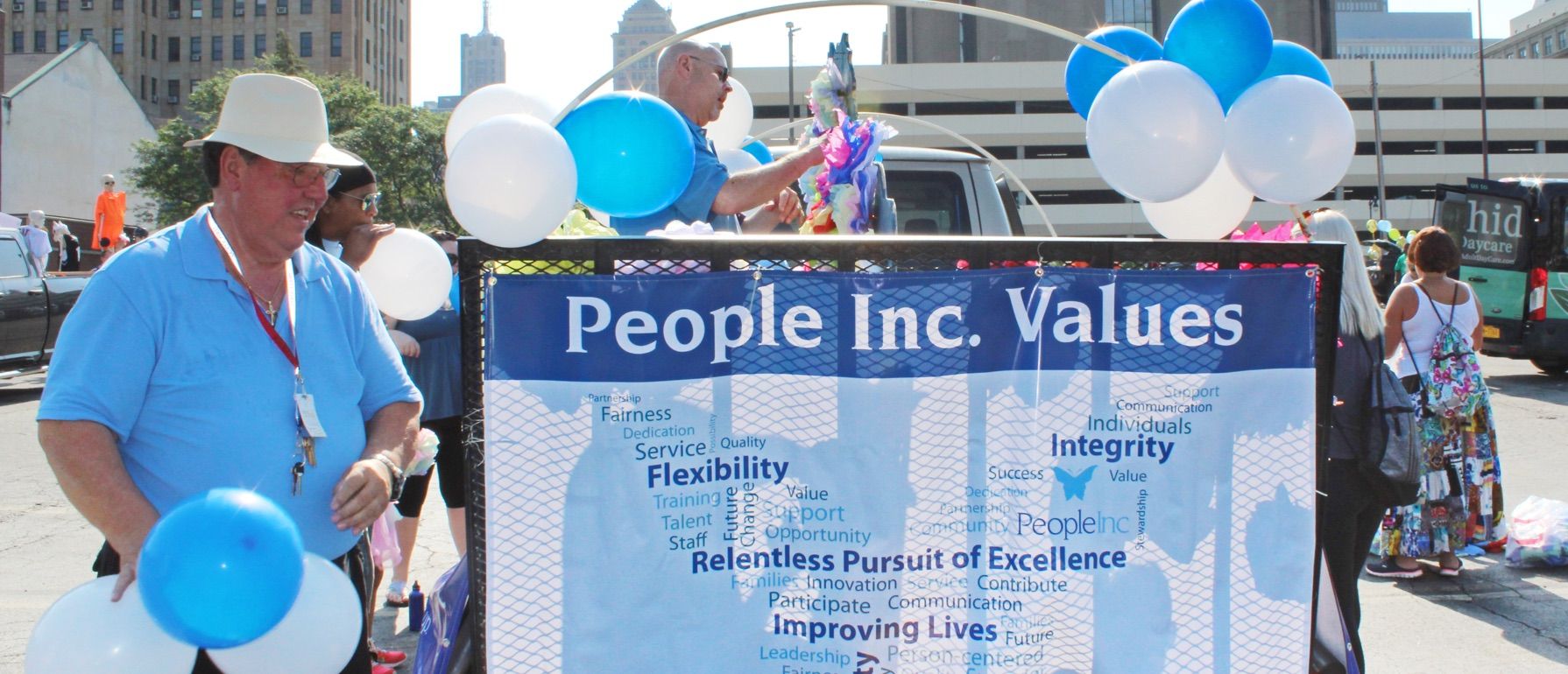 Upcoming events: Banner with People Inc. values surrounded by balloons