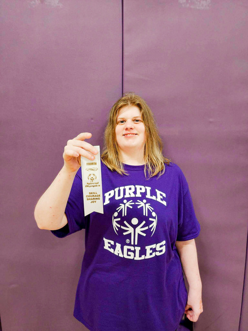 Athlete Holding Ribbon