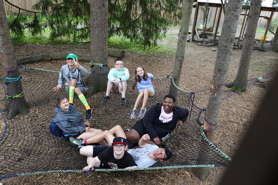 Enjoying the ropes course at Blueberry Treehouse Farm