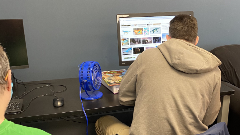 Person sitting at a computer