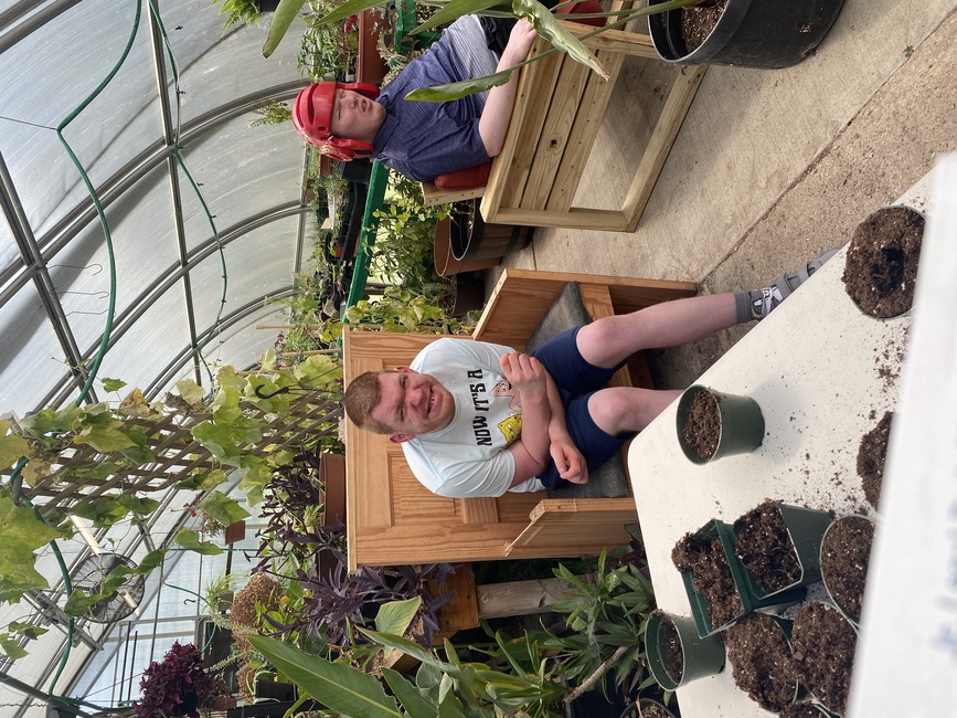 Relaxing in the greenhouse.